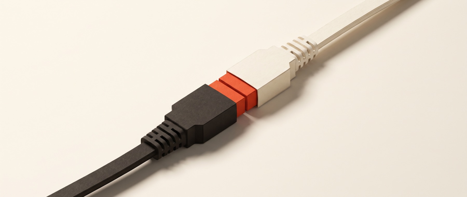 Two papercraft cable connectors meeting and joining at a vermilion coupling