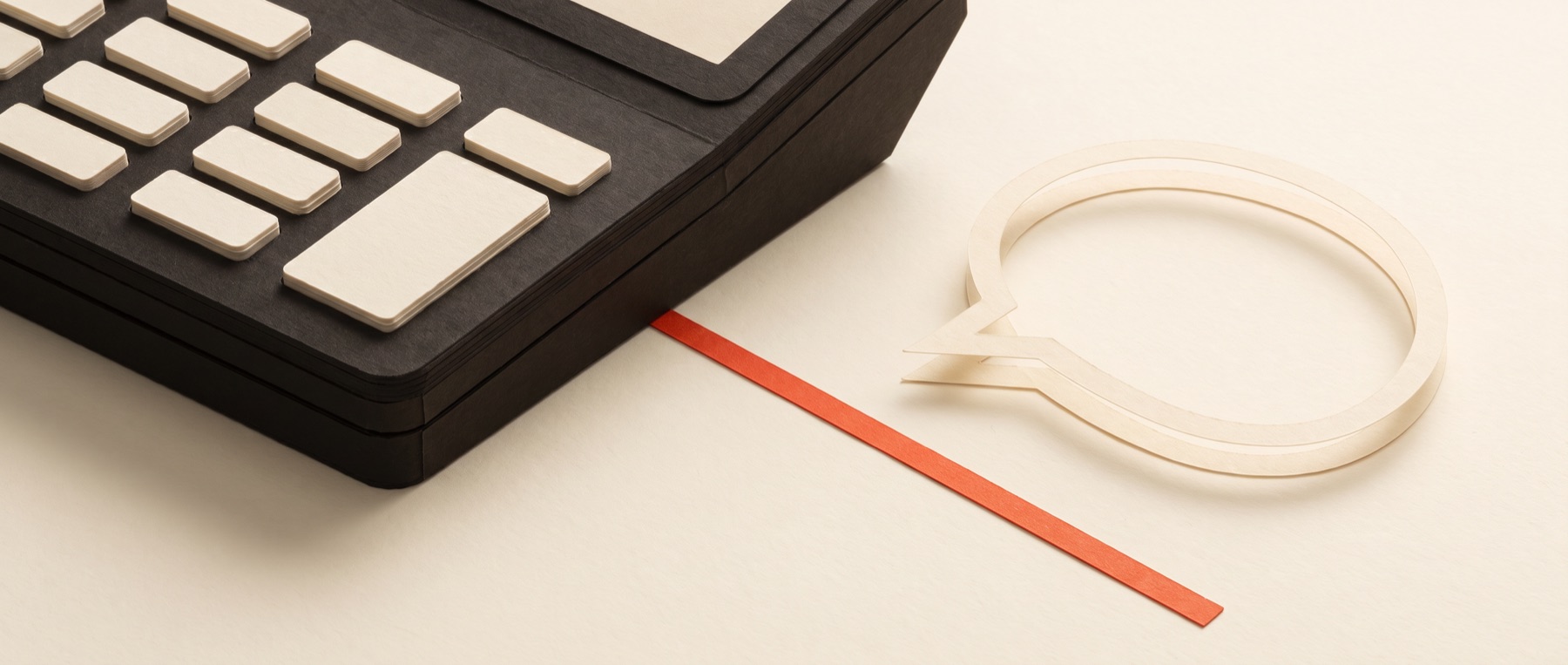 A solid charcoal papercraft calculator beside a thin, hollow, empty paper speech bubble